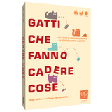 Gatti che fanno cadere cose